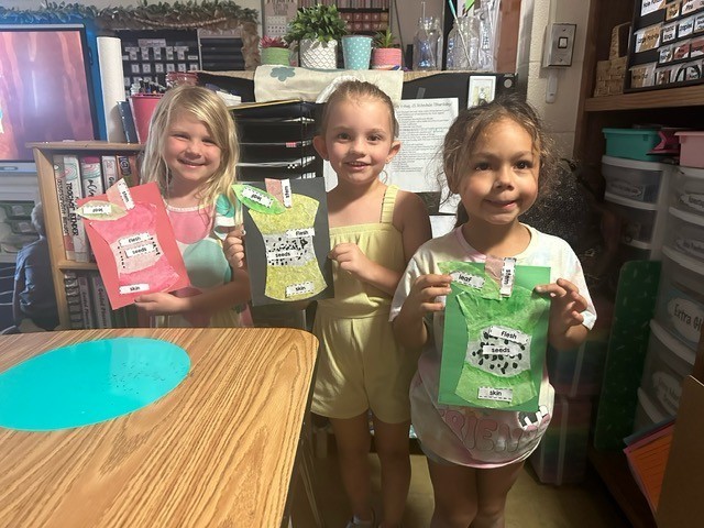 Students are completing apple projects. 