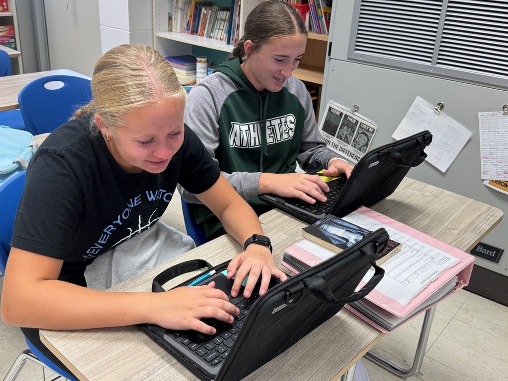 Students are collaborating on an Outsiders Escape Room.