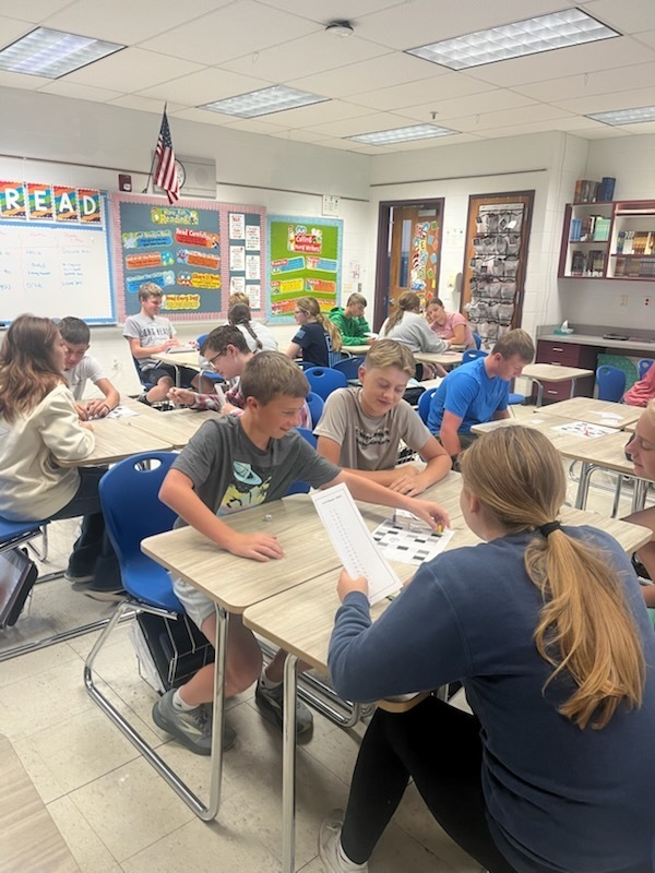 Students are playing a subject-verb agreement game.