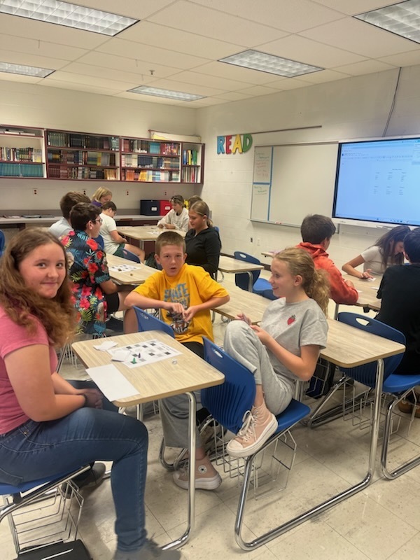 Students are playing a subject-verb agreement game.
