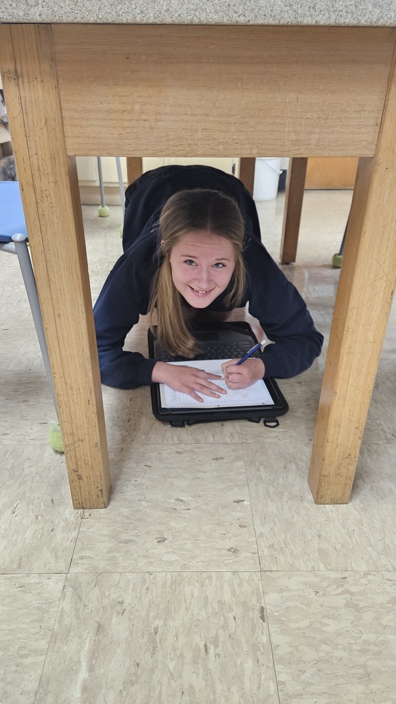 A student is tracing an animal anatomy from from her device.