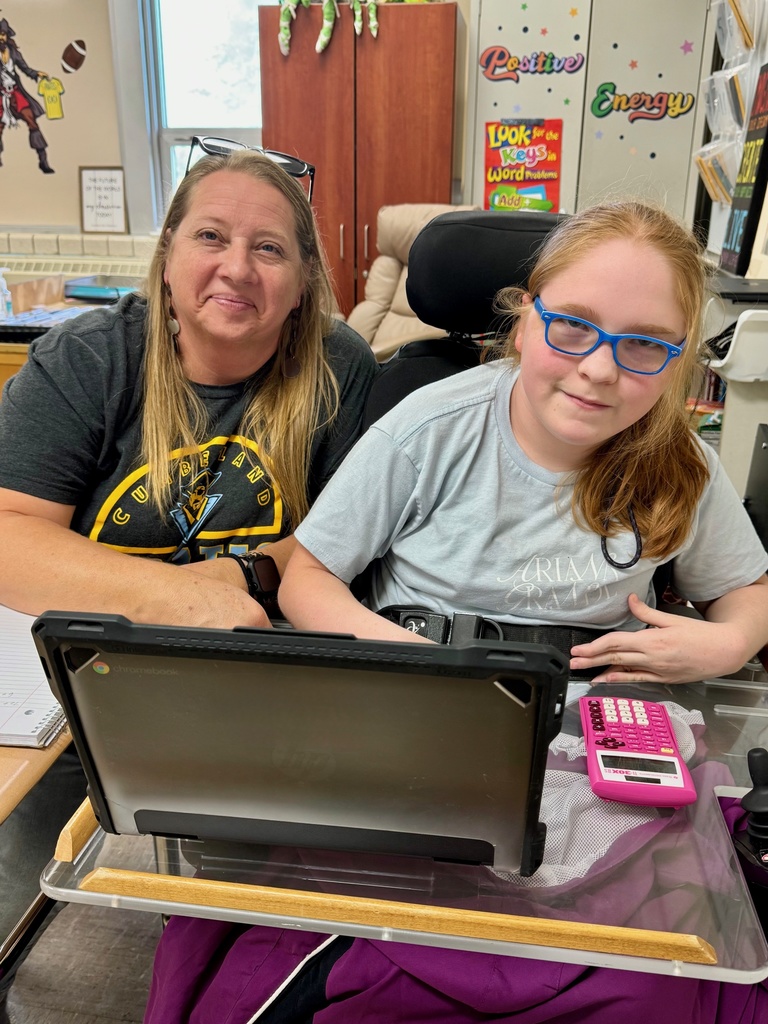 The picture is of Mrs. Boswell sitting next to Nevaeh.