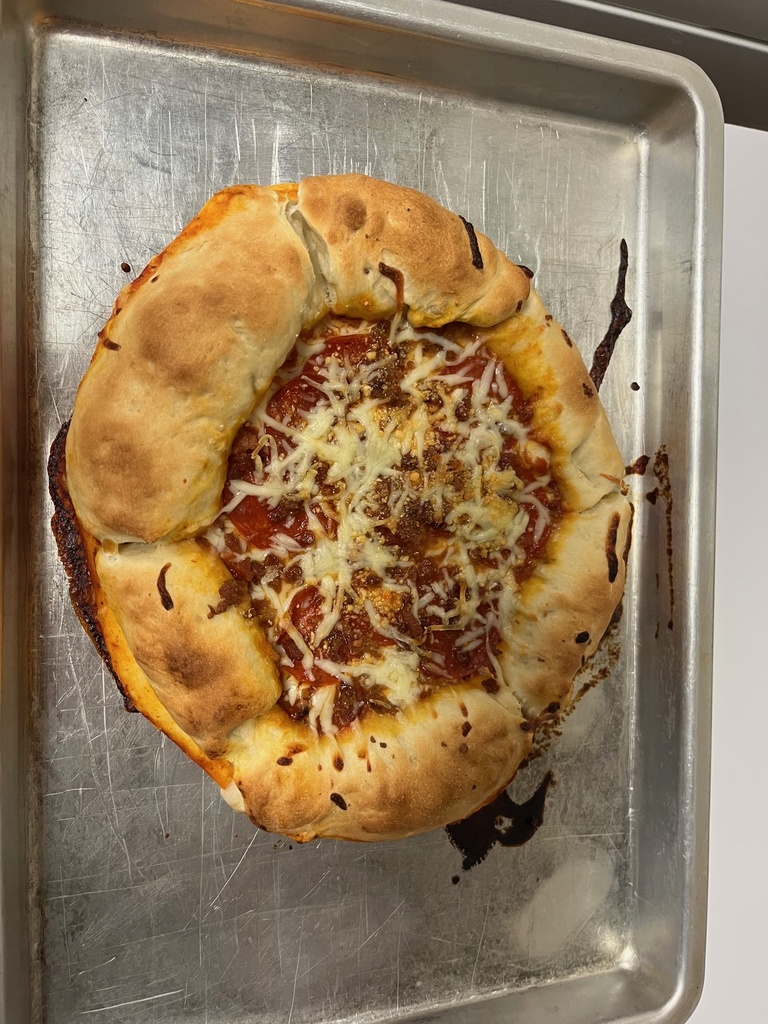 Displayed is a picture of a stuffedcrust pizza.