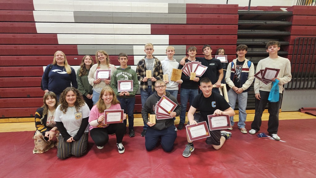 The students who participaed are pictured. They are holding their numerous awards from the day. 
