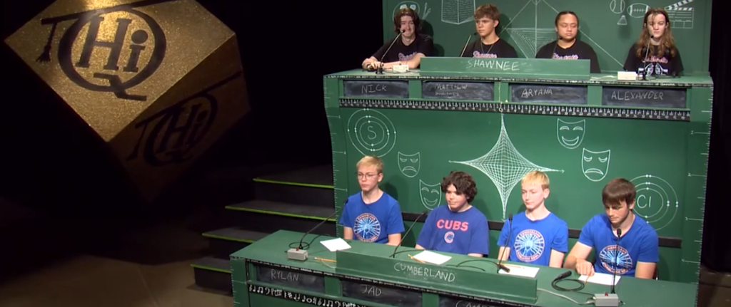 The students are on the set of Hi-Q. They won this match. 