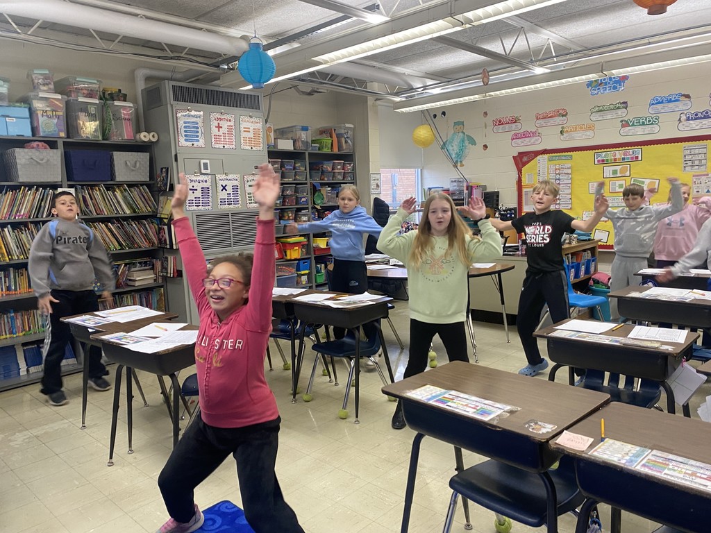 Students are seeing how many times they can jumping jack in 67 seconds. 