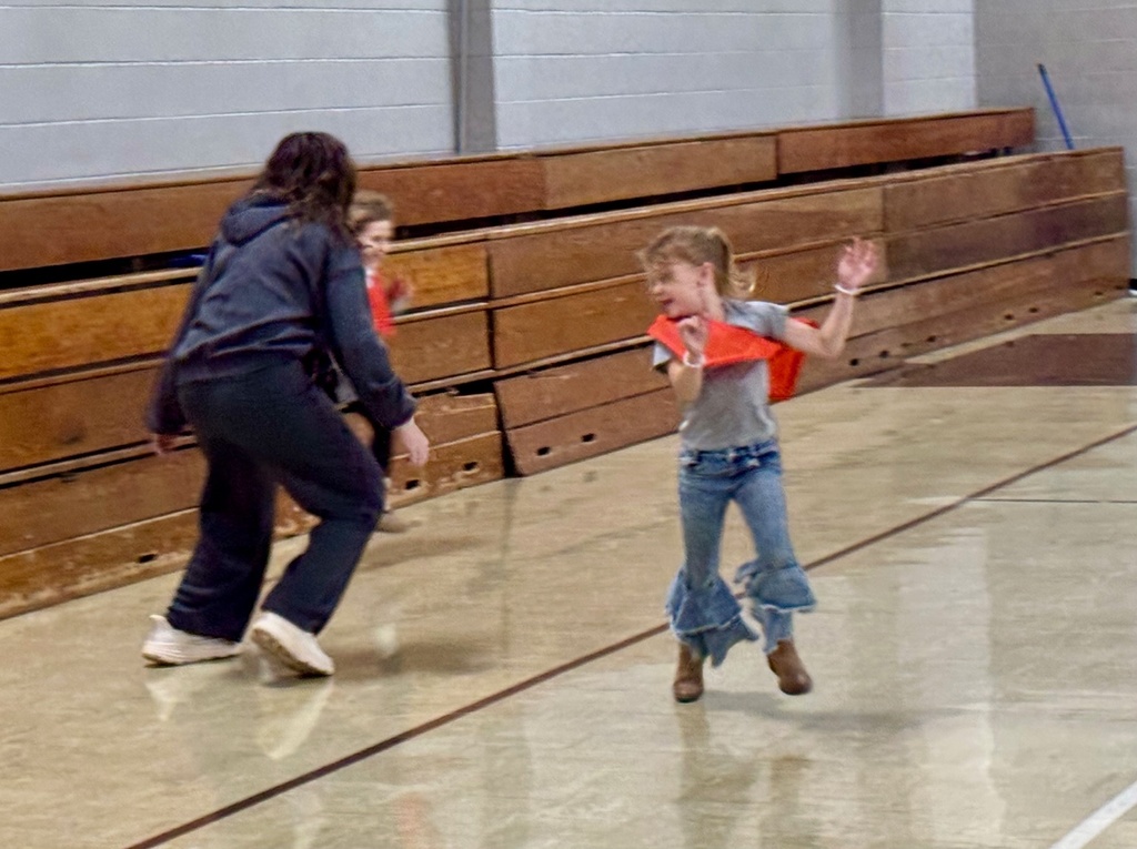 The teacher is trying to capture two students to join the hunters. 