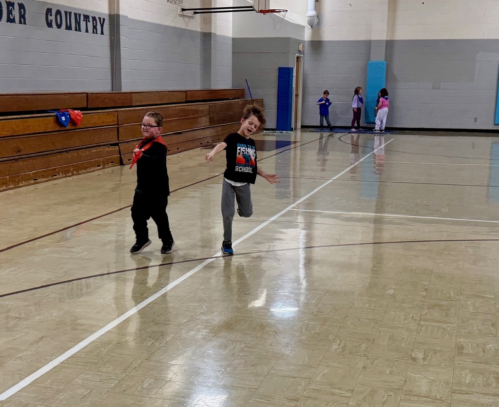 Twp students are running to the haystack. 