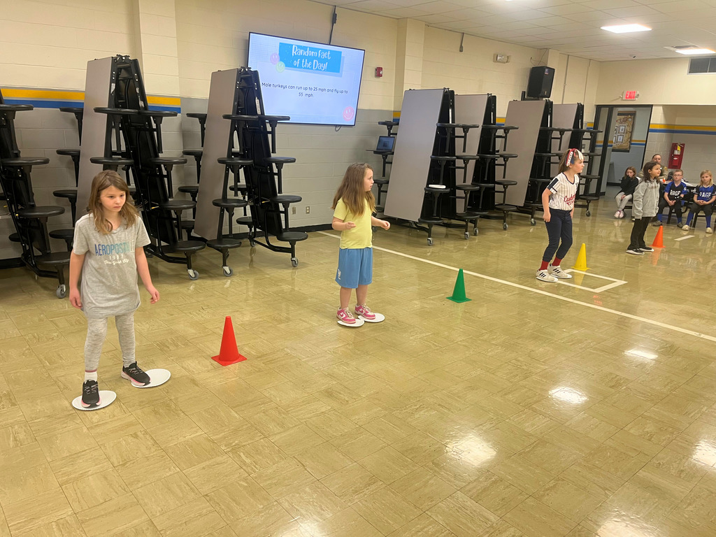 St;udents are racing in an Olympic event. 