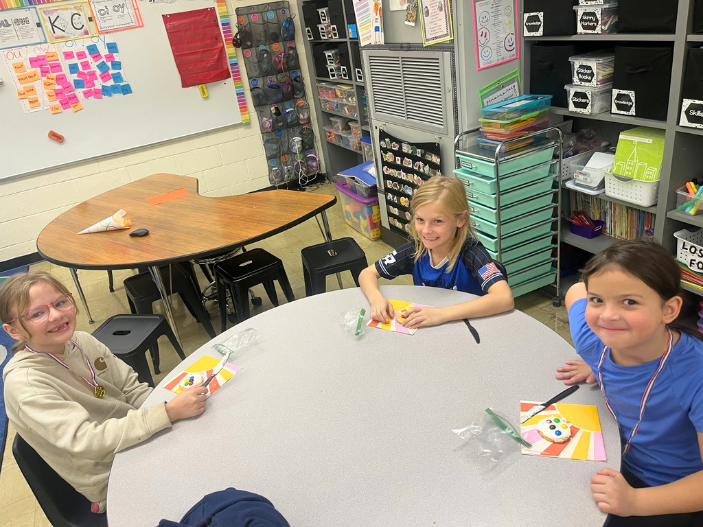 Students are eating a snack. 