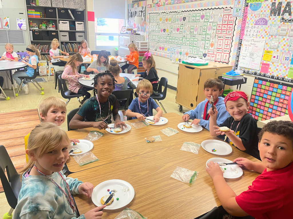 Students are eating a snack. 