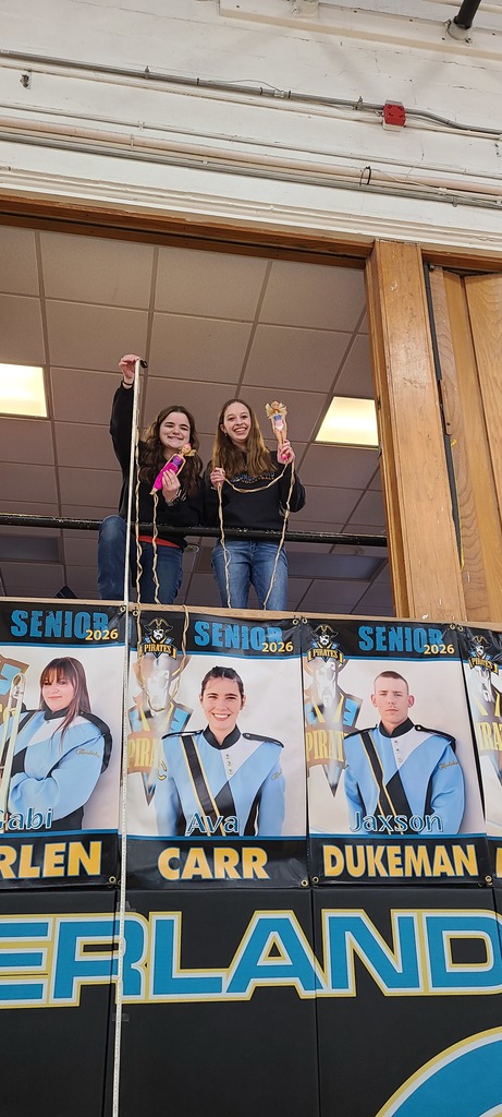Students are meaduring the distance that the Barbie will jump of attached to rubberbands.