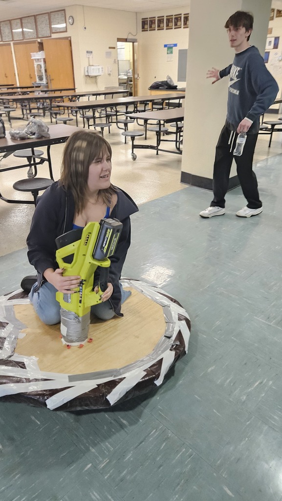 A student is riding the hovercraft.