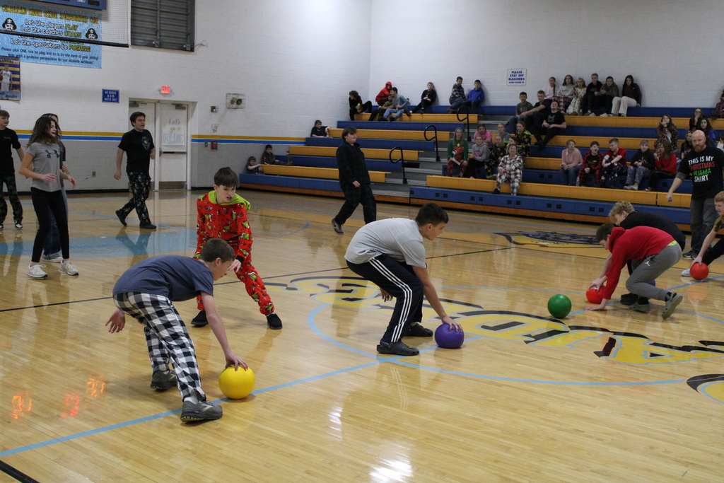 Students are running for the ball. 