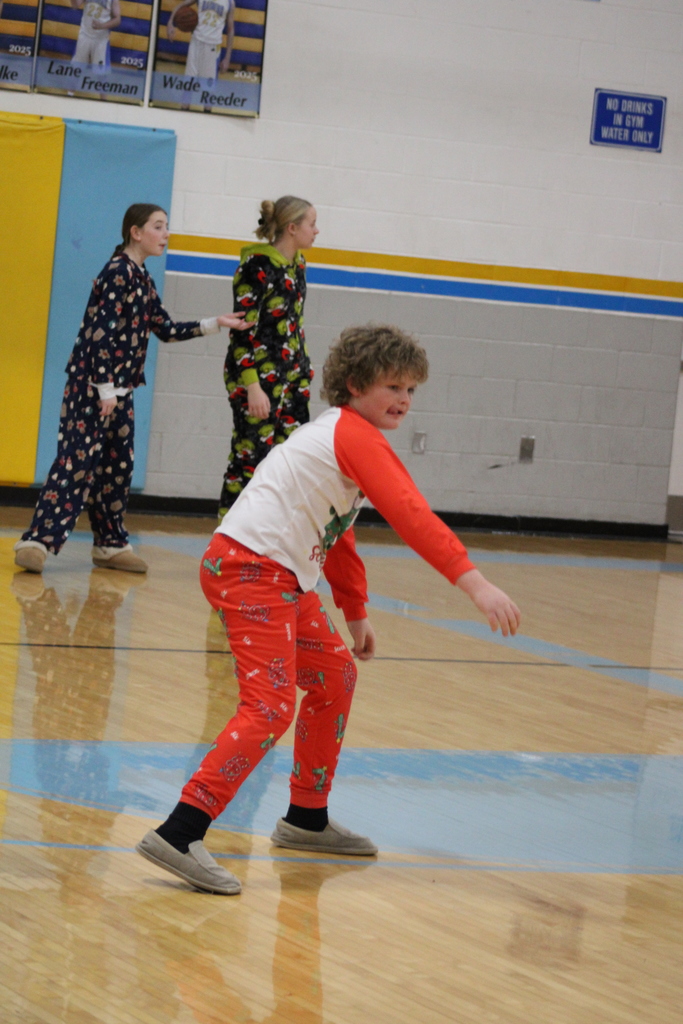 A student is throwing a ball. 