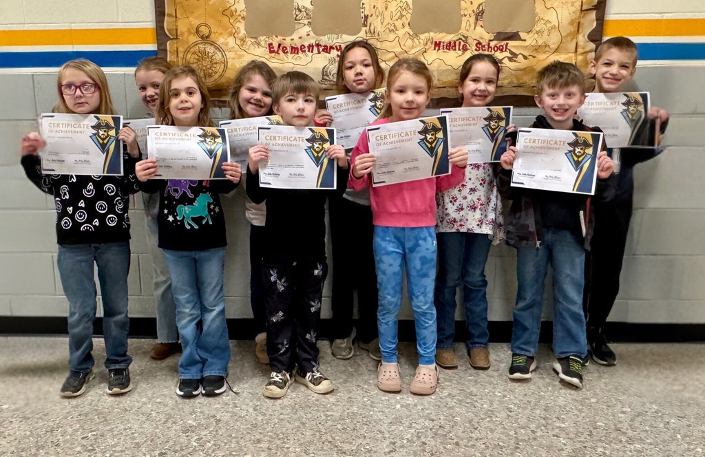 Pictured are the 1st grade students. They are holding their perfect attendance certificates. 