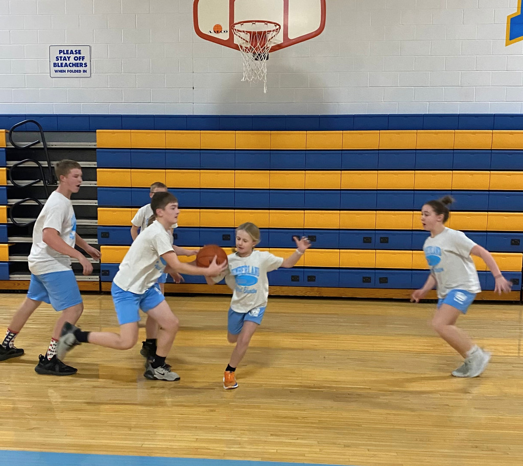 Teams are playing 3-on-3 basketball games. They are playing in the gym which is shaded in yellow and blue colors.