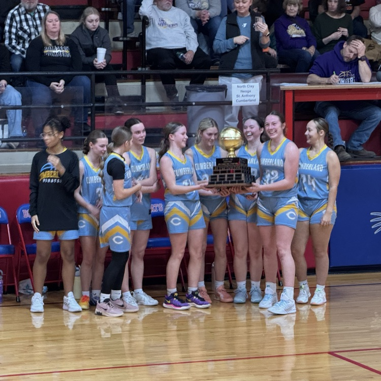 Pictured is the team aft accepting the trophy  