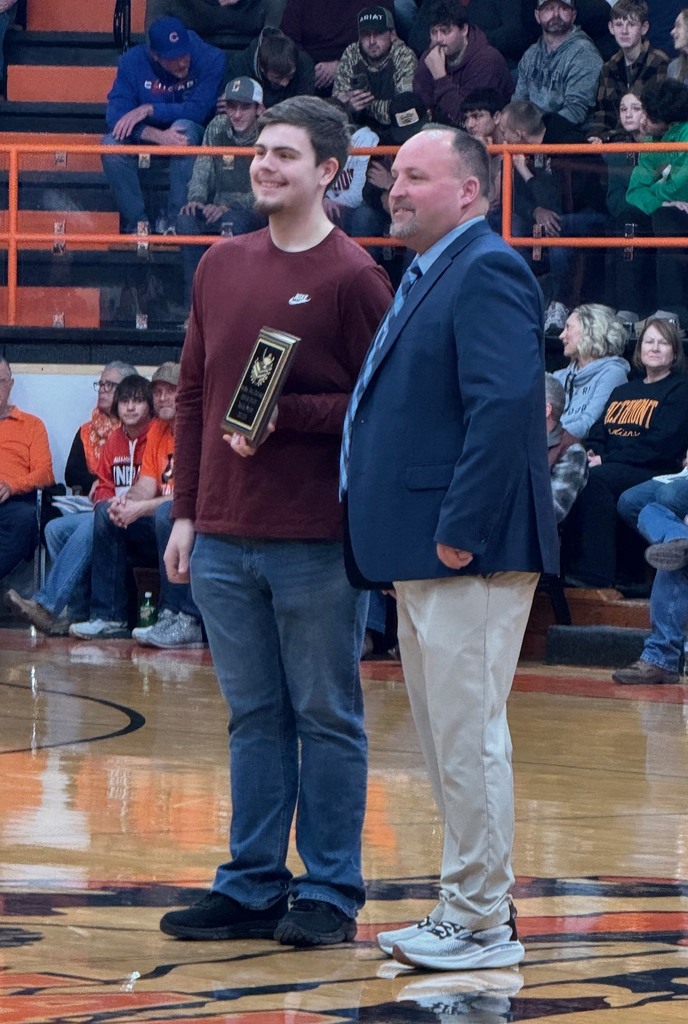 Pictured is AB with the president of the NTC. He has been given his plaque for her nomination. 
