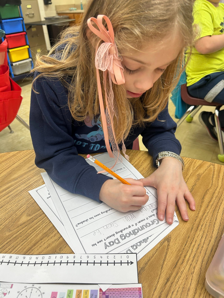 The student is answering questions about Groundhog Day. 