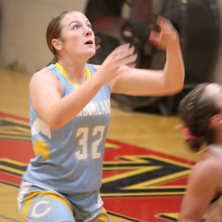 AD is waiting for a rebound. her arms are up and she’s looking up