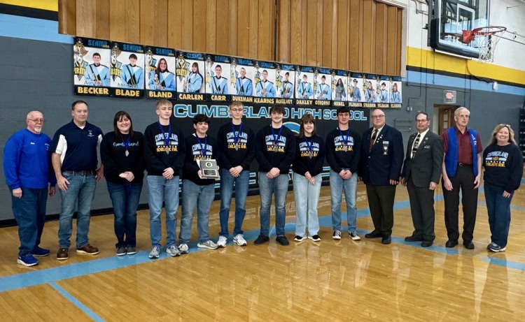 Pictured is the CHS team with the coaches and the Masonic officials. They are holding their black.