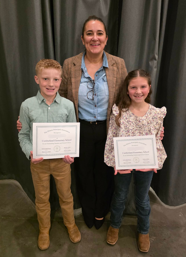 Pictured are two students and their principal. The students are holding their certificates. 