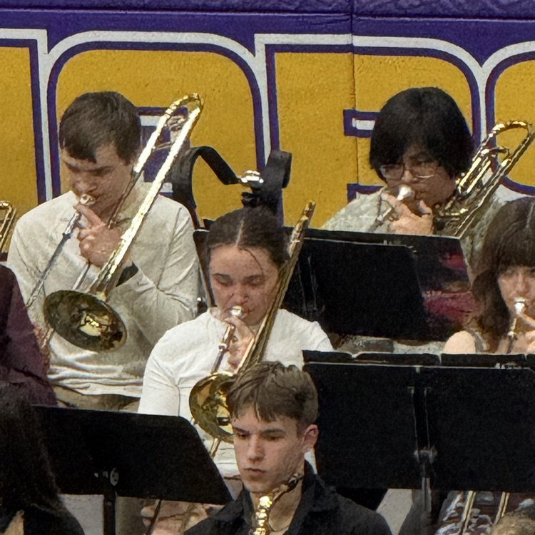 The trombone section is paying a song. 