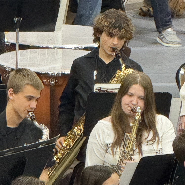 The saxophone section is paying a song. 