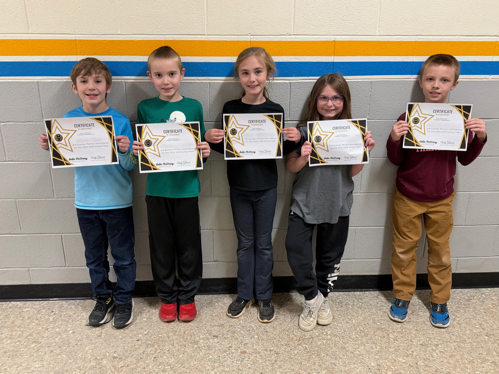 Pictured are five students holding their perfect attendance certificates.