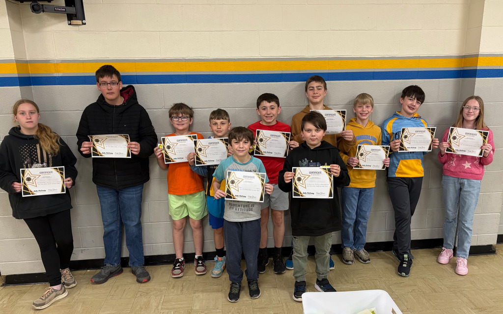 Pictured is one of the groups. The students are holding their certificates. 