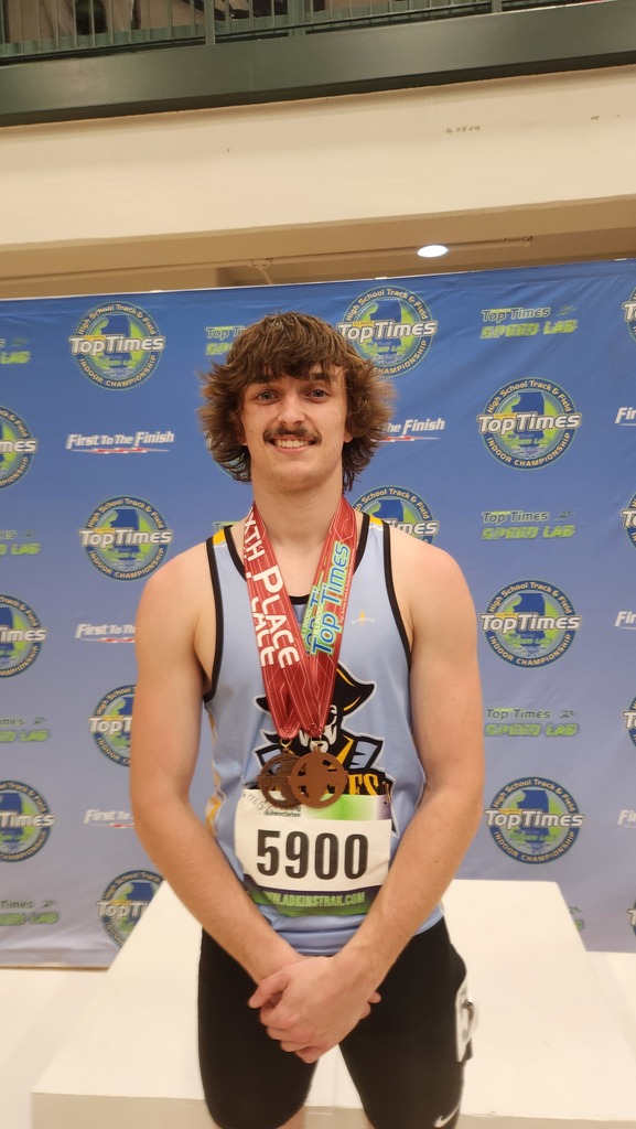 RC is pictured with his two medals. 