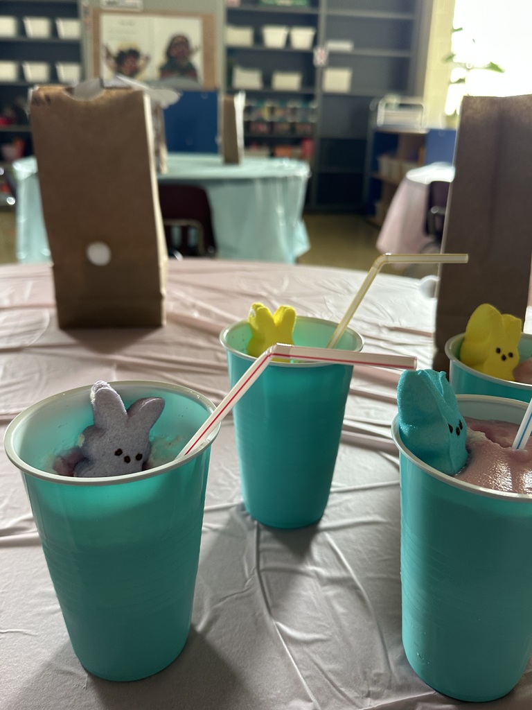 There are three cups with punch, a peep, and a straw in each.