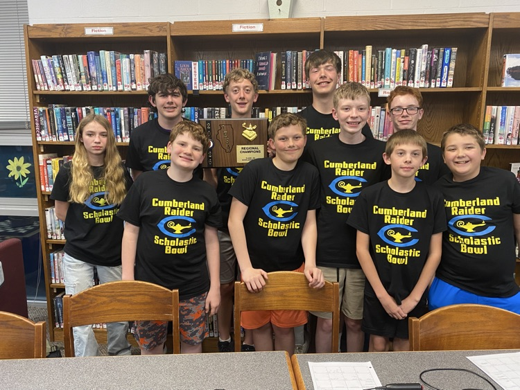 Pictured are teh 10 members of the scholastic bowl team. One is holding their regional plaque. 