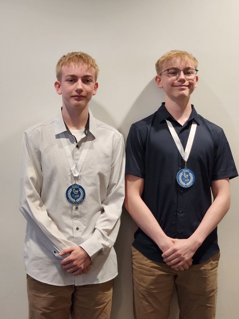 Pictured are the two Cumberland students wearing their medals. 