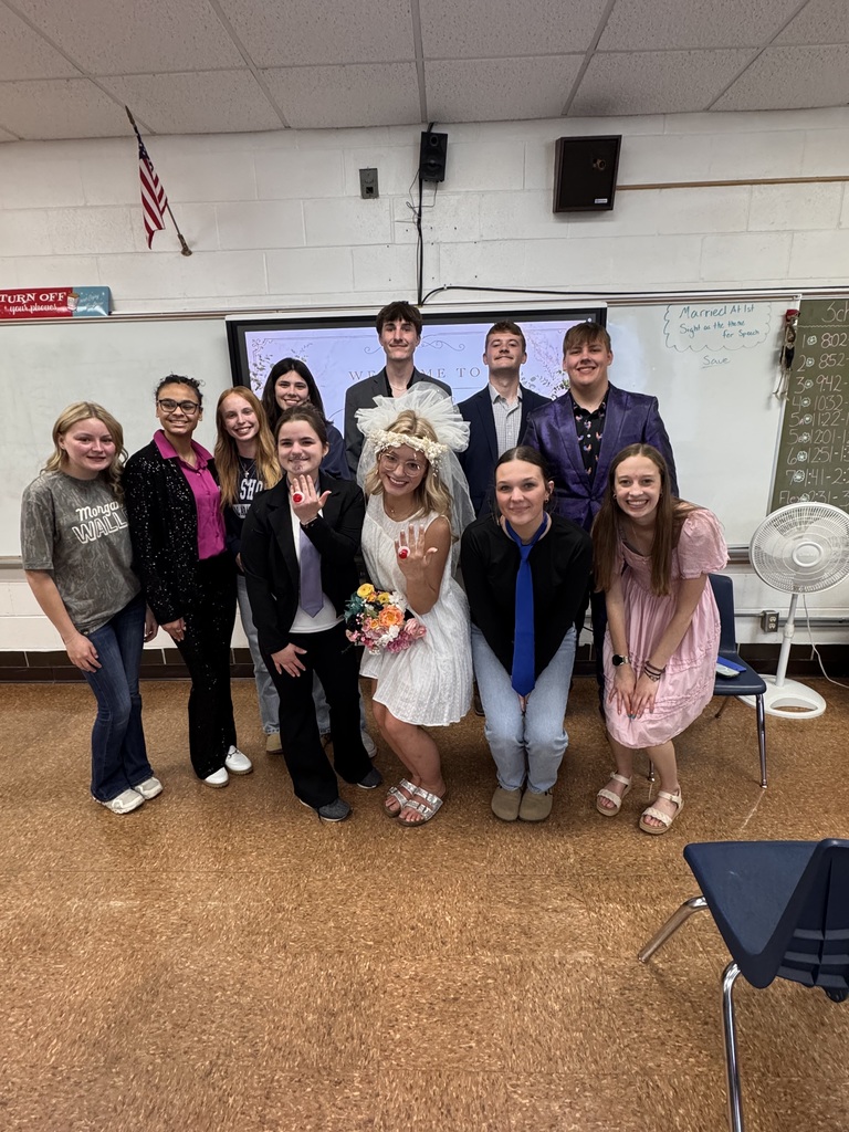 The Married at First sight group is all together in their wedding attire. 