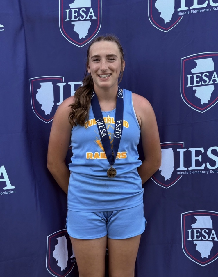 Pictured is the Discus athlete wearing the medal. 