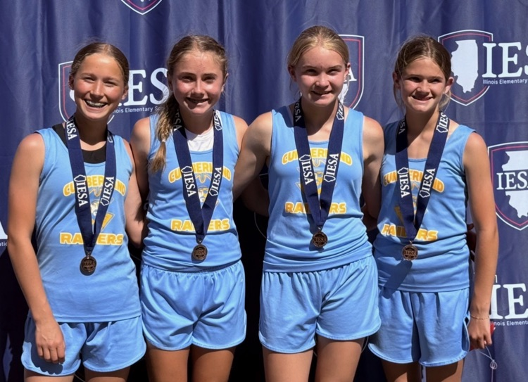 Pictured is the SMR athletes wearing the medals. 