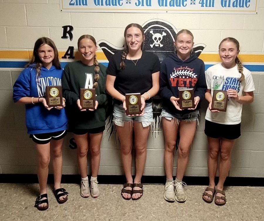 7th Grade Girls winners with plaques. 