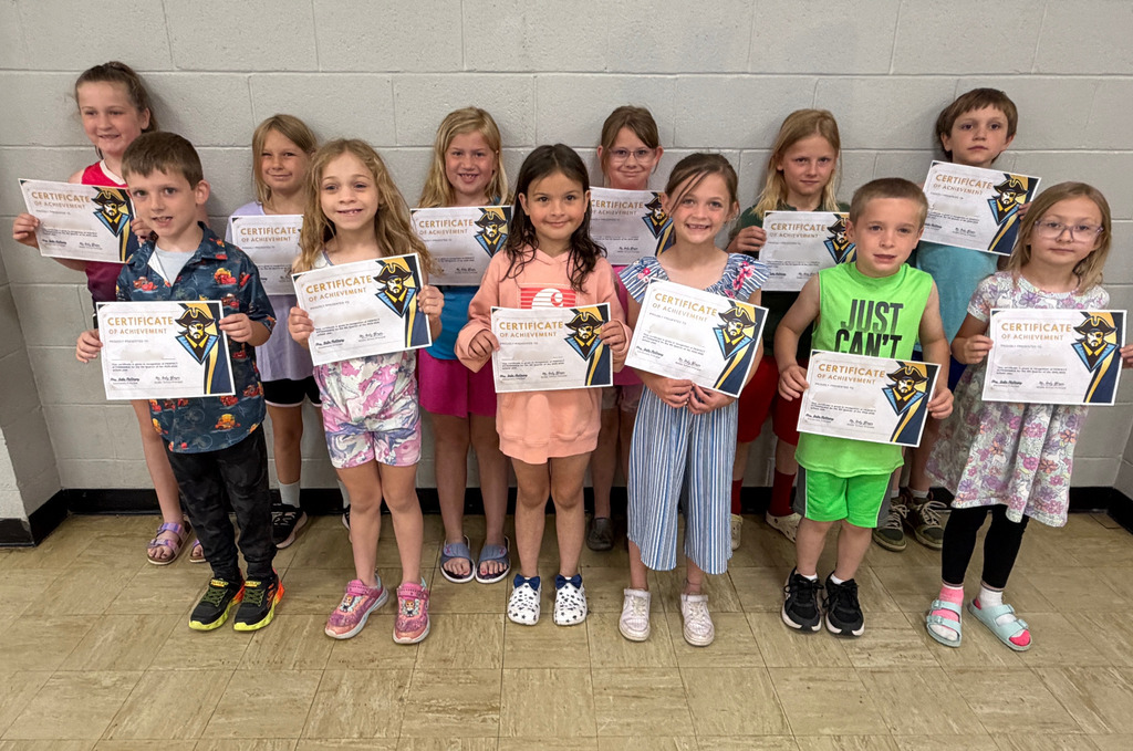 Pictured are 12 students who had perfect attendance for 4th quarter. 