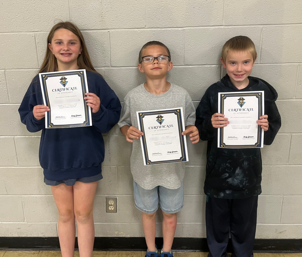 Pictured are the three students. They are holding their certificates. 