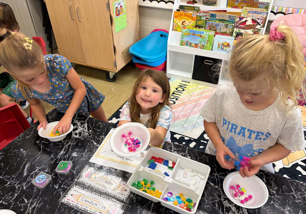Students are counting out objects to make number soup.