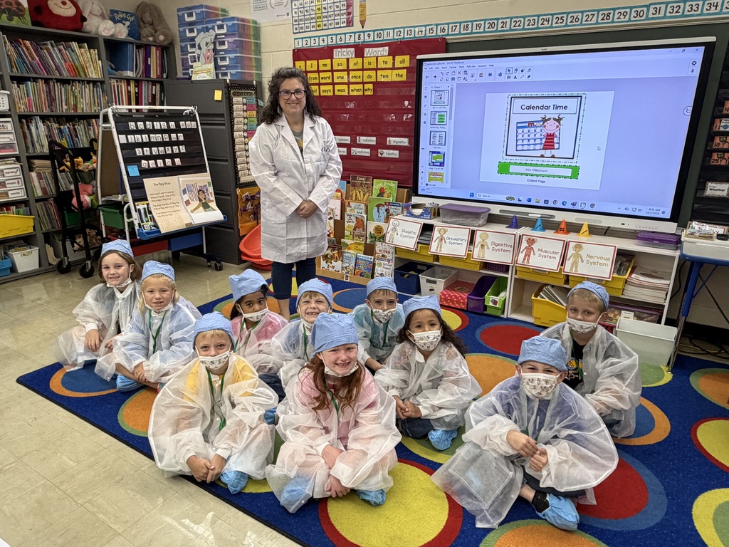 This is one of the classes dressed as doctors. They have scrubs, hats, IDs, and masks. 