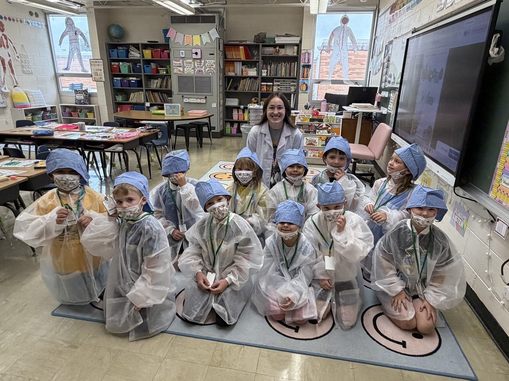 This is one of the classes dressed as doctors. They have scrubs, hats, IDs, and masks. 