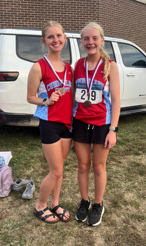 Pictured are the two girls medalists wearing their medals.