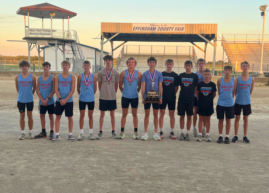 Pictured is the boys team with their team trophy.