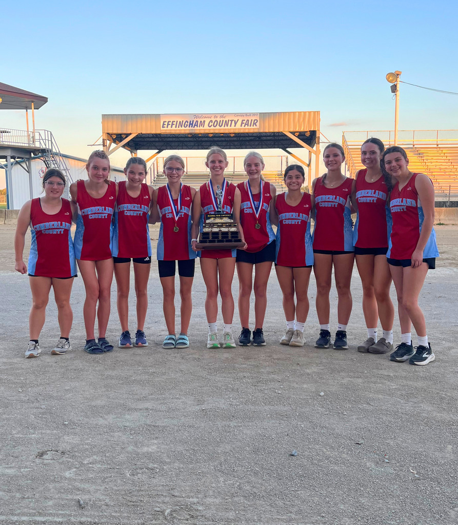 Pictured is the girls team holding their team trophy.