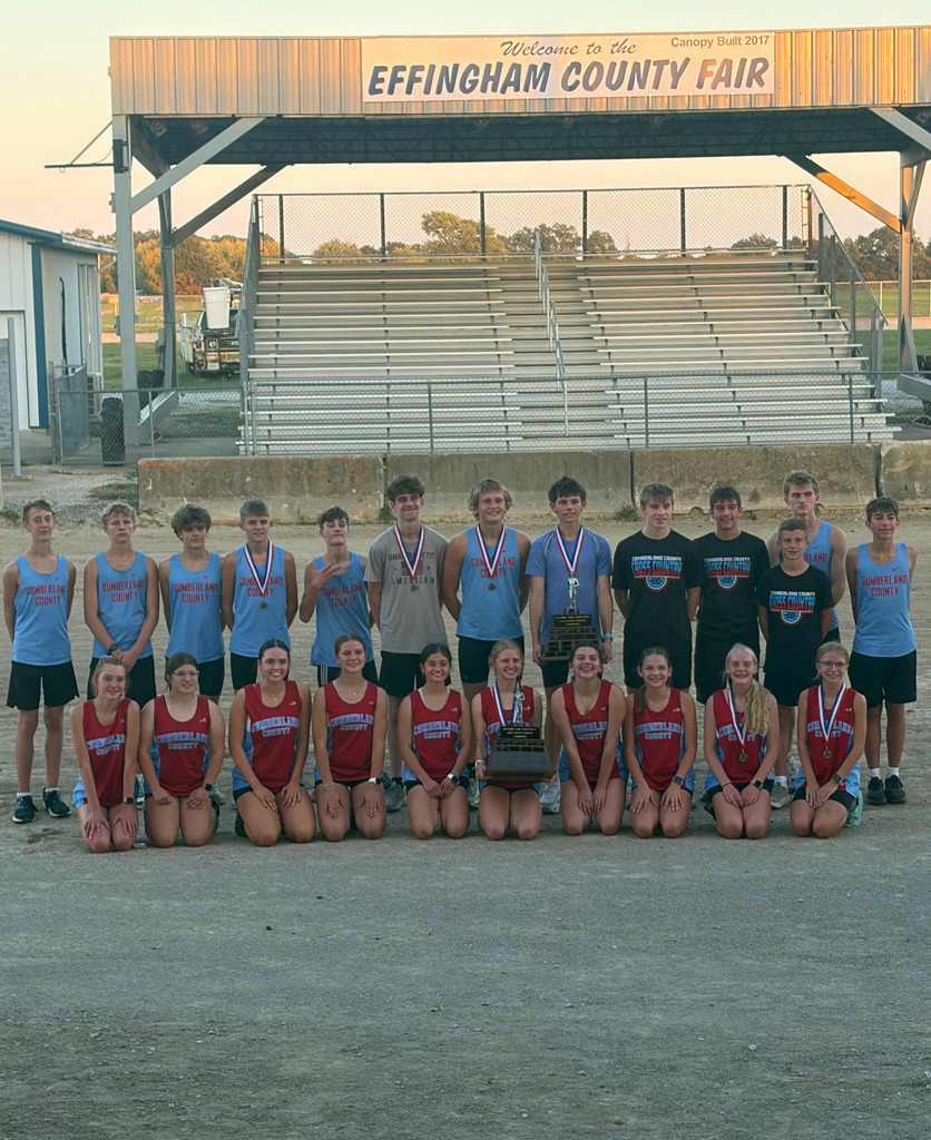 Pictured are the girls and boys teams holding their team trophys.