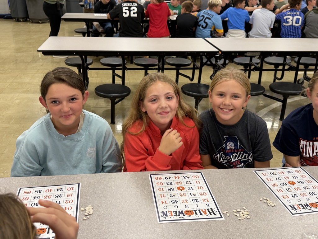 Three students are playing Bingo. 