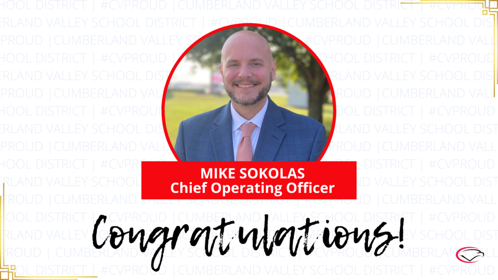 Mike Sokolas, Chief Operating Officer, with 'Congratulations' banner and CVSD backdrop.